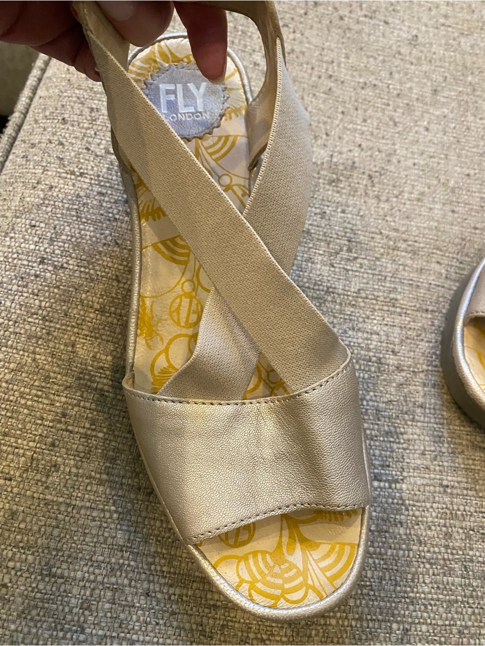 FLY London Women's Shimmery Gold Crisscross Elastic Sandals